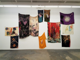 Art installation of linens hanging